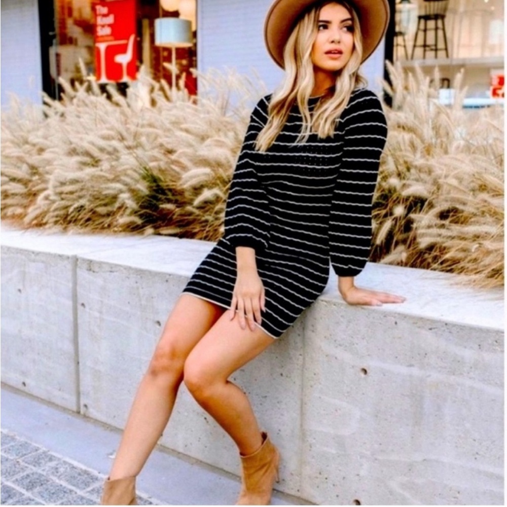 Kittenish Black and White Sheath Dress with Bishop Sleeves